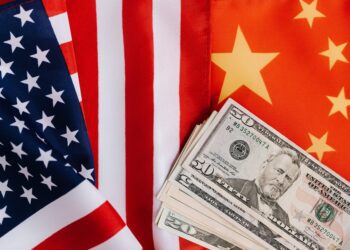 american and chinese flags and usa dollars