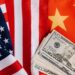 american and chinese flags and usa dollars