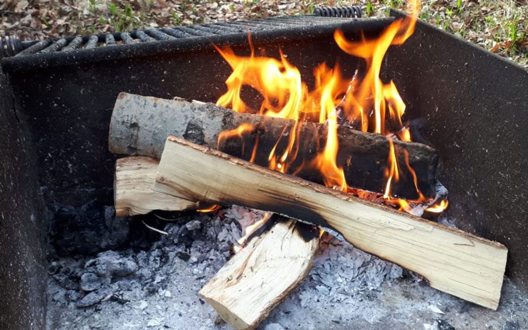 Fire in an outdoor fireplace.